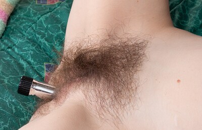 Ophelia Jones in Ophelia Jones strips and masturbates in a bedroom from We Are Hairy