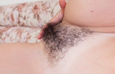 Diana Douglas in Diana Douglas masturbates on her sofa after work from We Are Hairy