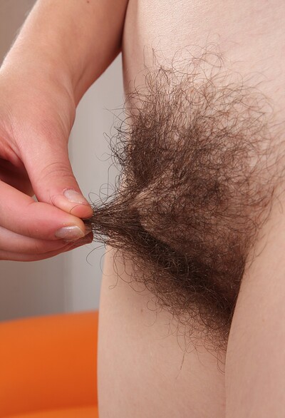 Nessy in Pale Nessy spreads her furry pussy lips from We Are Hairy