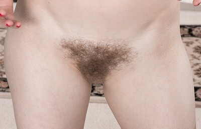 Evane Nordstern in Evane Nordstern strips naked in her living room from We Are Hairy