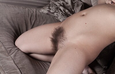 Dominique in Dominique touches her hairy body on a couch from We Are Hairy