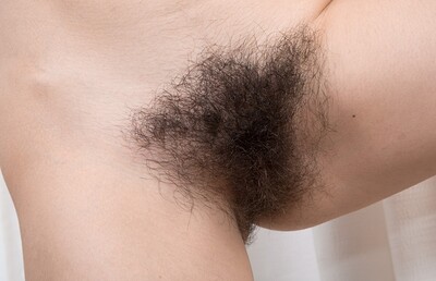 Ole Nina in We Are Hairy set Ole Nina enjoys her wardrobe and masturbates