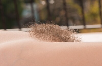 Valentine in Valentine strips naked while on her balcony from We Are Hairy