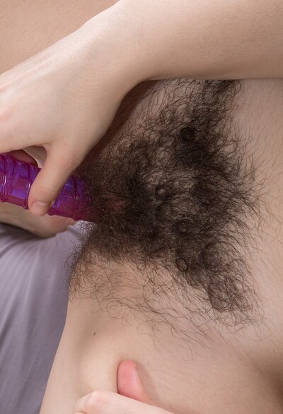 Ole Nina in Ole Nina masturbates with her vibrator in her bed from We Are Hairy