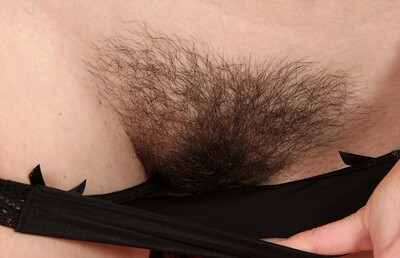 Thelma in Thelma tugs on her hairy pussy from We Are Hairy