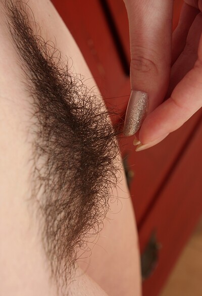 Thelma in Thelma tugs on her hairy pussy from We Are Hairy