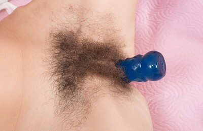 Efina in Efina masturbates in her room with her vibrator from We Are Hairy
