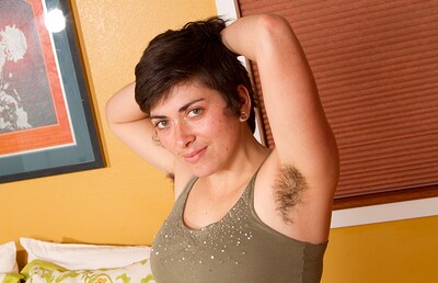 Louise in Cruvy Louise spreads on the bed from We Are Hairy