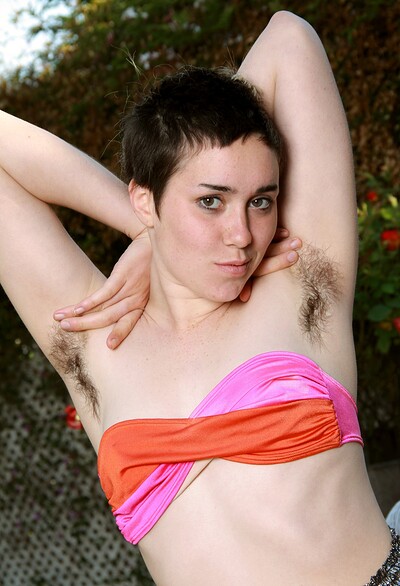 Barb in Barb spreads her pale legs outside from We Are Hairy