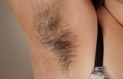 Hickory in Hairy Hickory lifts her denim skirt from We Are Hairy
