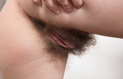Efina in Efina masturbates with her pink dildo from We Are Hairy