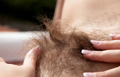 Kandie Luv in Kandie Luv pulls on her thick bush from We Are Hairy