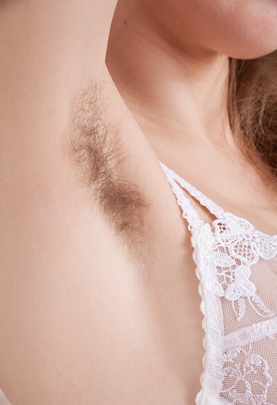 Lavatta W in Lavatta W masturbates in bed in her lingerie from We Are Hairy