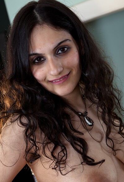 Riani in Riani shows off her curvy body in white from We Are Hairy