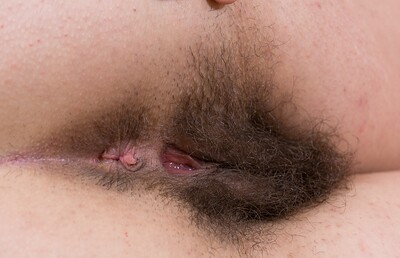 Guadalupe in Guadalupe strips naked while laying in bed from We Are Hairy