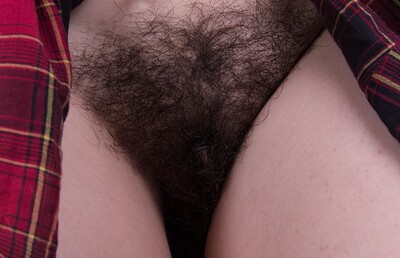 Ivy in Hairy babe Ivy studies in her school girl skirt from We Are Hairy