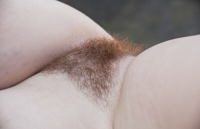 Jenny Davies in Jenny Davies rubs hairy pussy on the picnic table from We Are Hairy