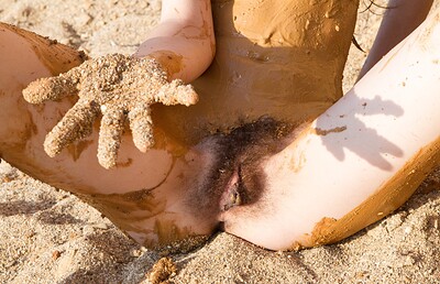 Erika in Erika gets sand in her hair from We Are Hairy