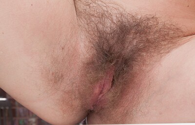 Bella Moore in Bella Moore masturbates in her kitchen to orgasm from We Are Hairy