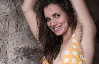 Natalia in Natalia strips naked by her staircase from We Are Hairy