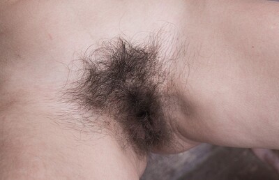 Natalia in Natalia strips naked by her staircase from We Are Hairy