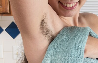 Ivy in Ivy is only wearing an apron and her pussy hair from We Are Hairy