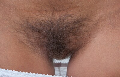 Promesita in Hairy babe Promesita enjoys sunny days from We Are Hairy