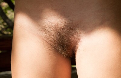 Era in Era shows off her hairy pussy outside in heels from We Are Hairy