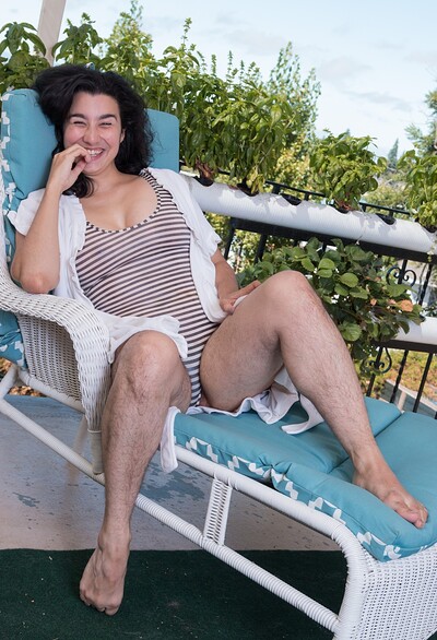 Wara in Wara strips naked in the sun on her balcony from We Are Hairy