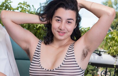 Wara in Wara strips naked in the sun on her balcony from We Are Hairy