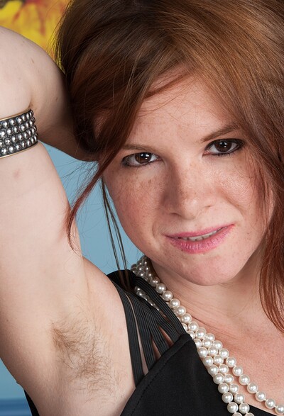 Zia in Fishnet stockings and black dress show hot redhead Zia from We Are Hairy