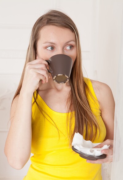 Stella in Sexy Stella sips coffee and gets naked naturally from We Are Hairy