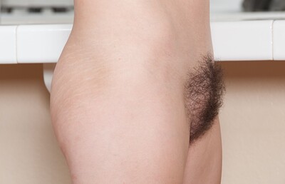 Cocco in Cocco strips in kitchen and plays with hairy pussy from We Are Hairy