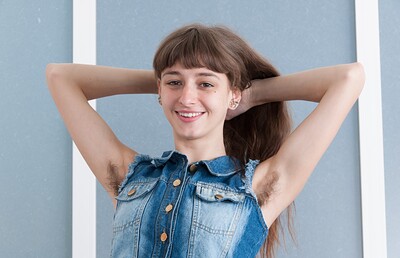 Willow in Young WIllow shows off hairy pits and hairy pussy from We Are Hairy