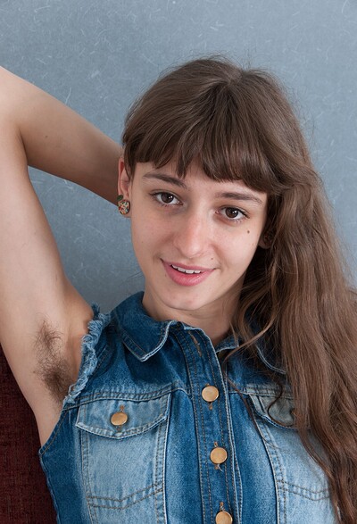 Willow in Young WIllow shows off hairy pits and hairy pussy from We Are Hairy