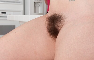 Simone Delilah in Stripping in the kitchen makes Simone horny from We Are Hairy