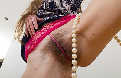 Ryisya in Ryisya strips and glides necklace across her body from We Are Hairy