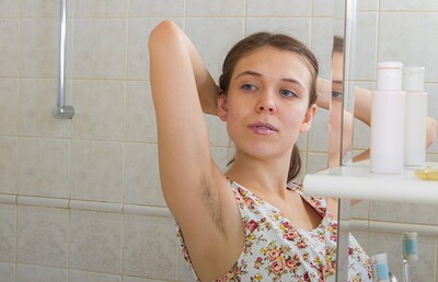 Agneta in Agneta strips and wets up her body in the shower from We Are Hairy