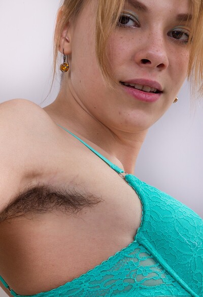 Alisia in Flexible Alisia strips and eats orange afterwards from We Are Hairy