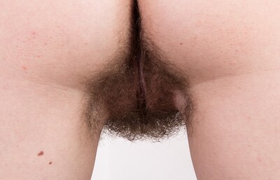 Viola R in Viola R takes off orange dress and stockings to play from We Are Hairy