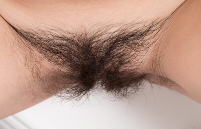 Amber in Amber strips naked on her toilet to unwind from We Are Hairy