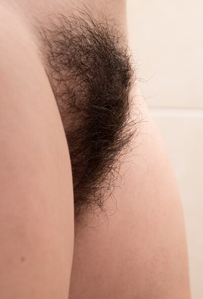 Amber in Amber strips naked on her toilet to unwind from We Are Hairy