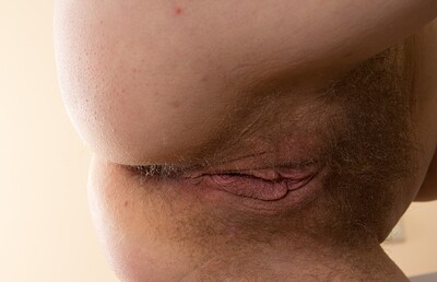 Ella Martin in Ella Martin strips naked by her kitchen table from We Are Hairy