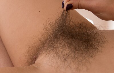 Polina in We Are Hairy set Polina finishes chores and strips naked on dresser
