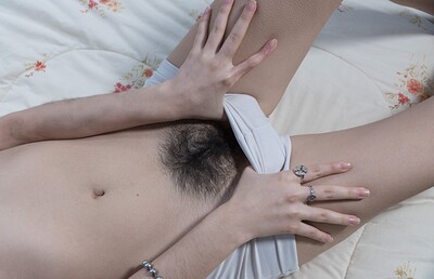 Ornella in Ornella wakes up horny and strips naked in bed from We Are Hairy