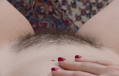 Kelly Morgan in Kelly Morgan strips naked in her living room from We Are Hairy