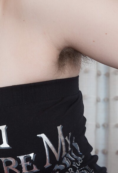 Kira Tomson in Kira Tomson strips and masturbates on her table from We Are Hairy