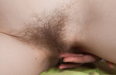 Alise in Alise strips and masturbates in her living room from We Are Hairy