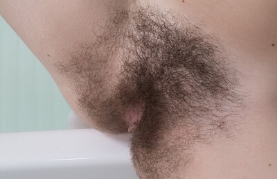 Kira Tomson in Kira Tomson masturbates in her bathroom by the tub from We Are Hairy