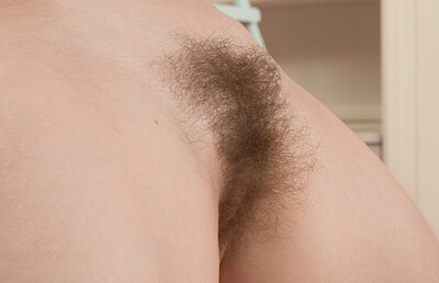 Aria in Aria shows off her sexy body on her bed from We Are Hairy